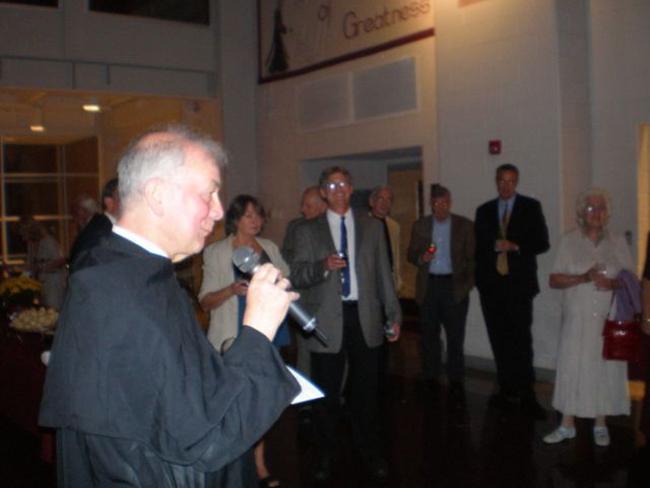 Dom Simon welcoming everyone at dinner